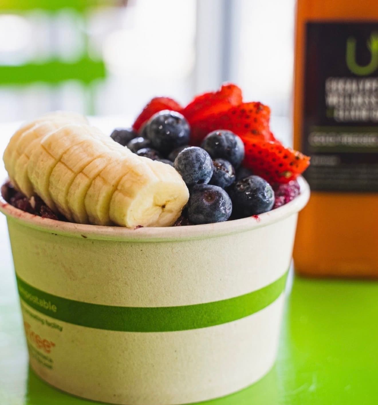 A Eucalyptus Wellness açaí bowl topped with banana, blueberries, and strawberries