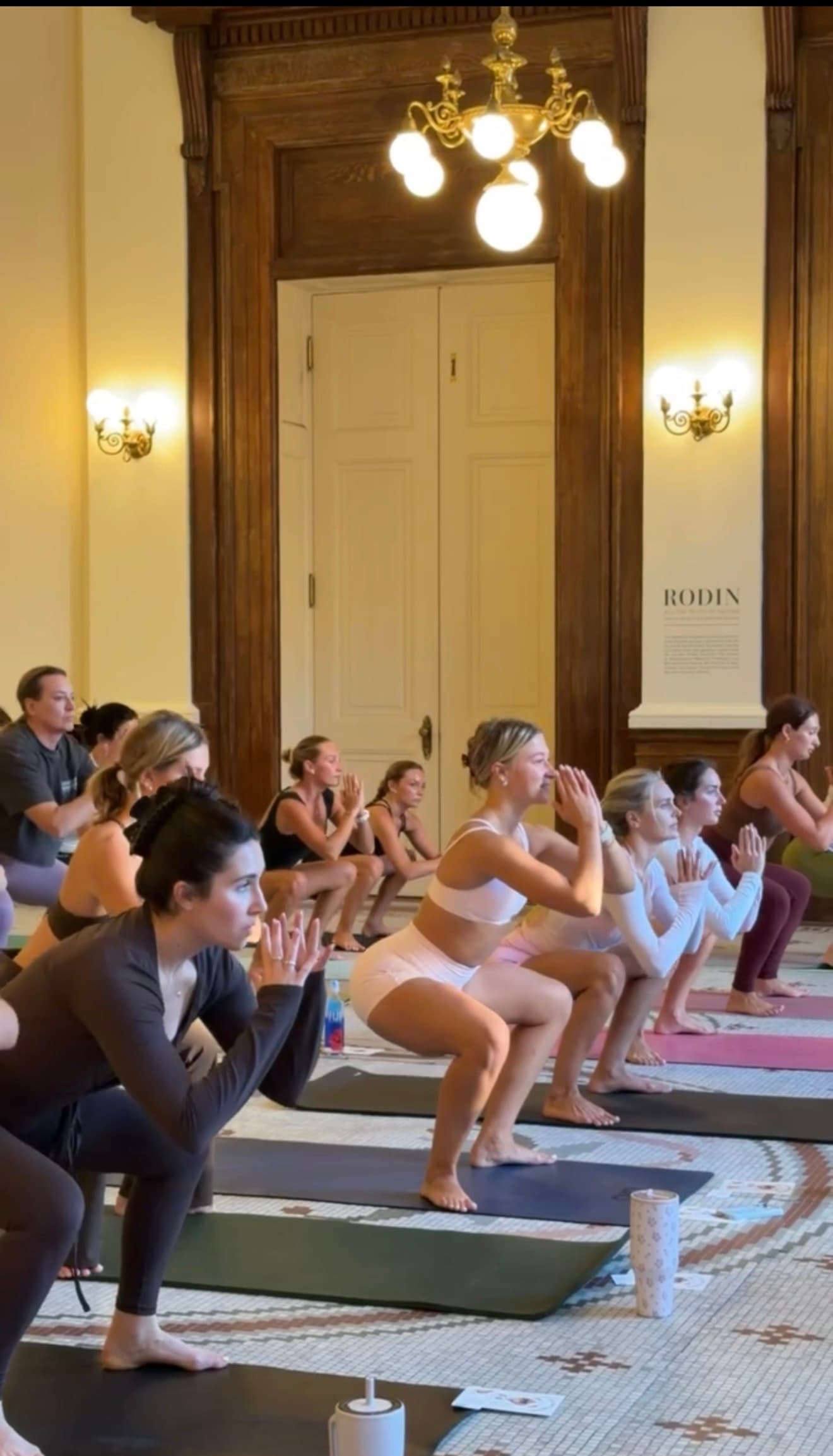 Guests closing a stretch, hands together